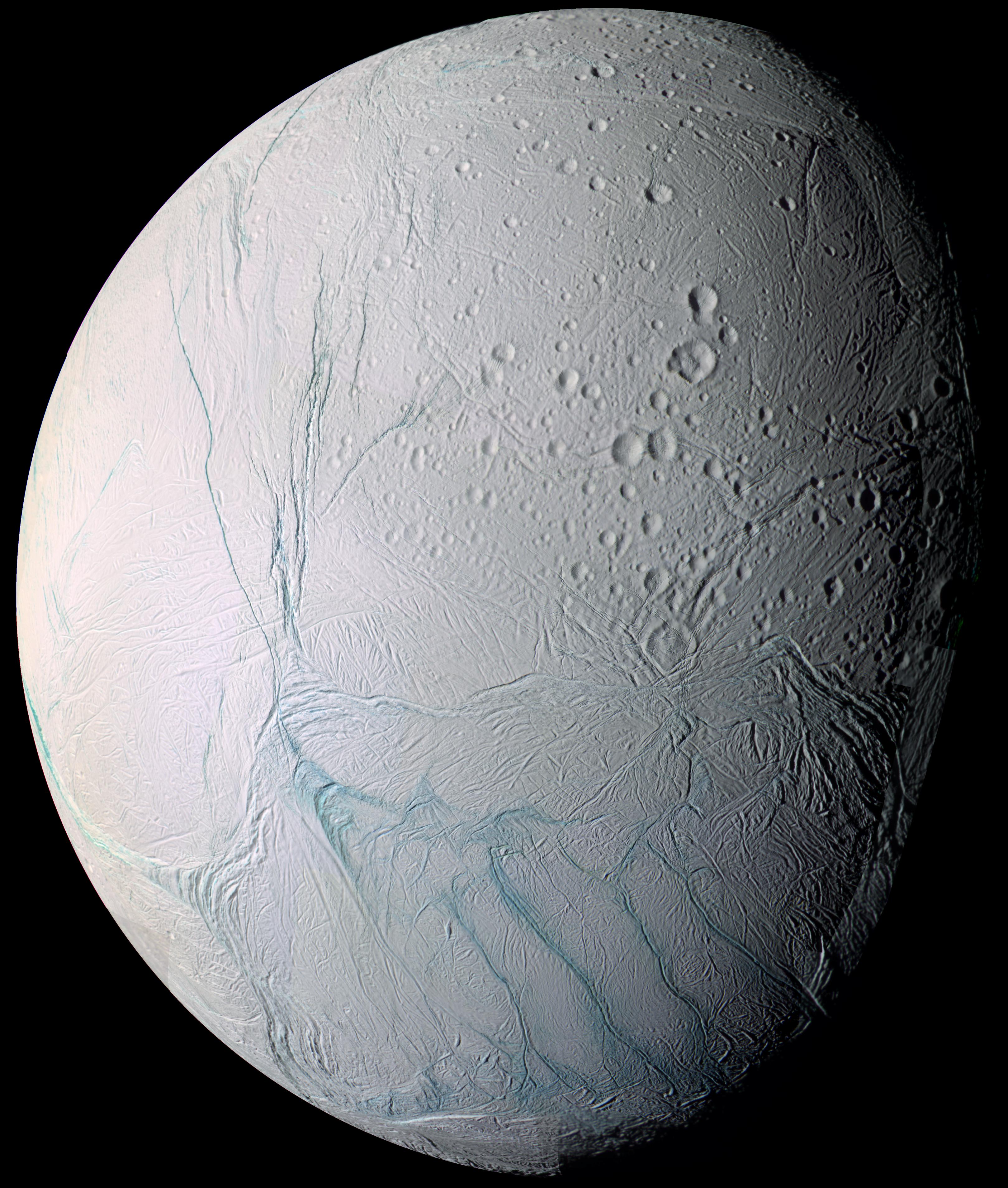 False-color full-disk mosaic of Enceladus showing fractured blue-green terrain in the south