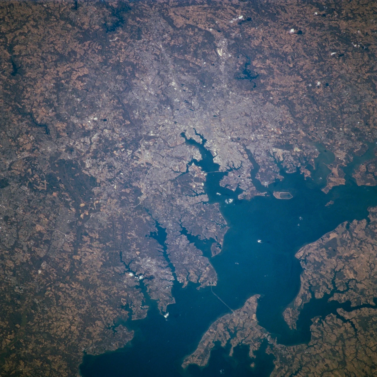 Baltimore's harbor on the Patapsco River and the western shore of Chesapeake Bay, seen from Space Shuttle Atlantis